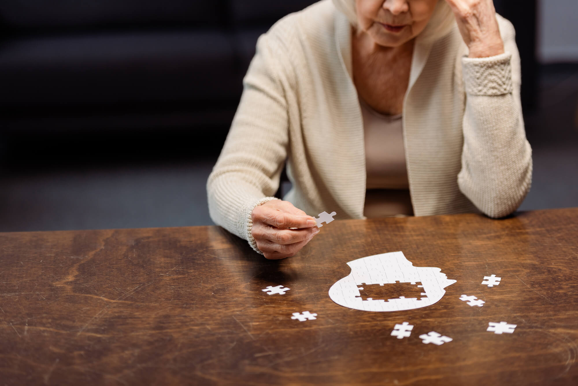 Old woman having a hard time because of memory loss